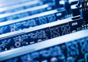 Close-up of server motherboard circuits and cables in data center rack